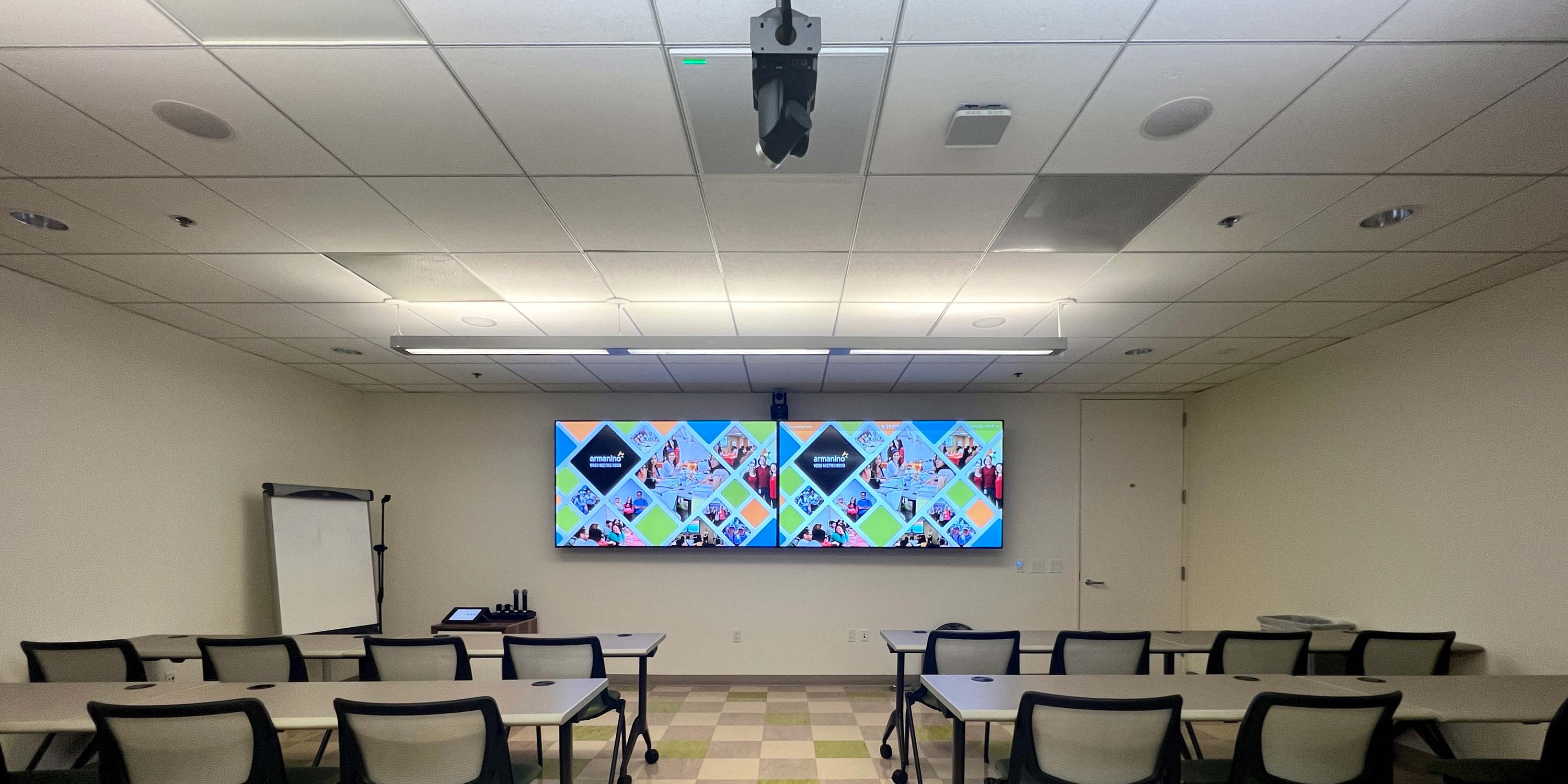 training area with lighting and tv