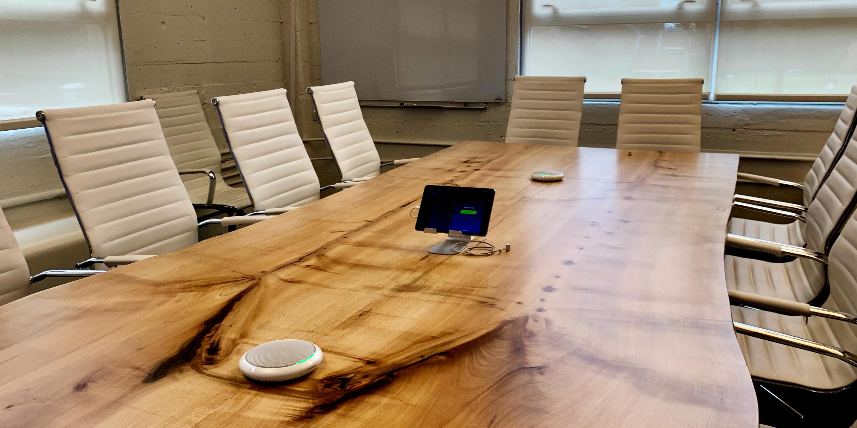conference room with wood edge table