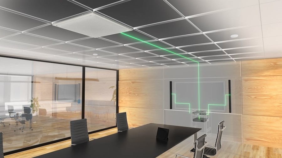  Yamaha ceiling-mounted microphone above a conference room table. Green lines show the behind-the-scenes wiring needs.